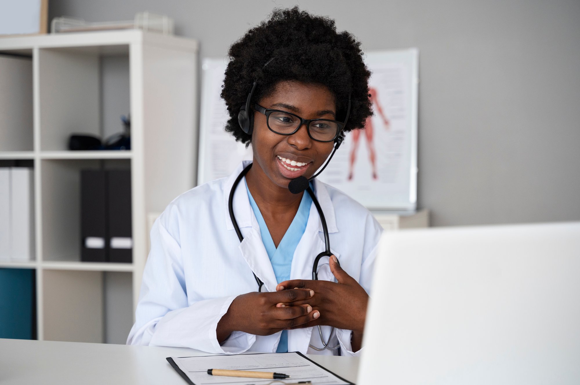 doctor-working-with-laptop-front-view