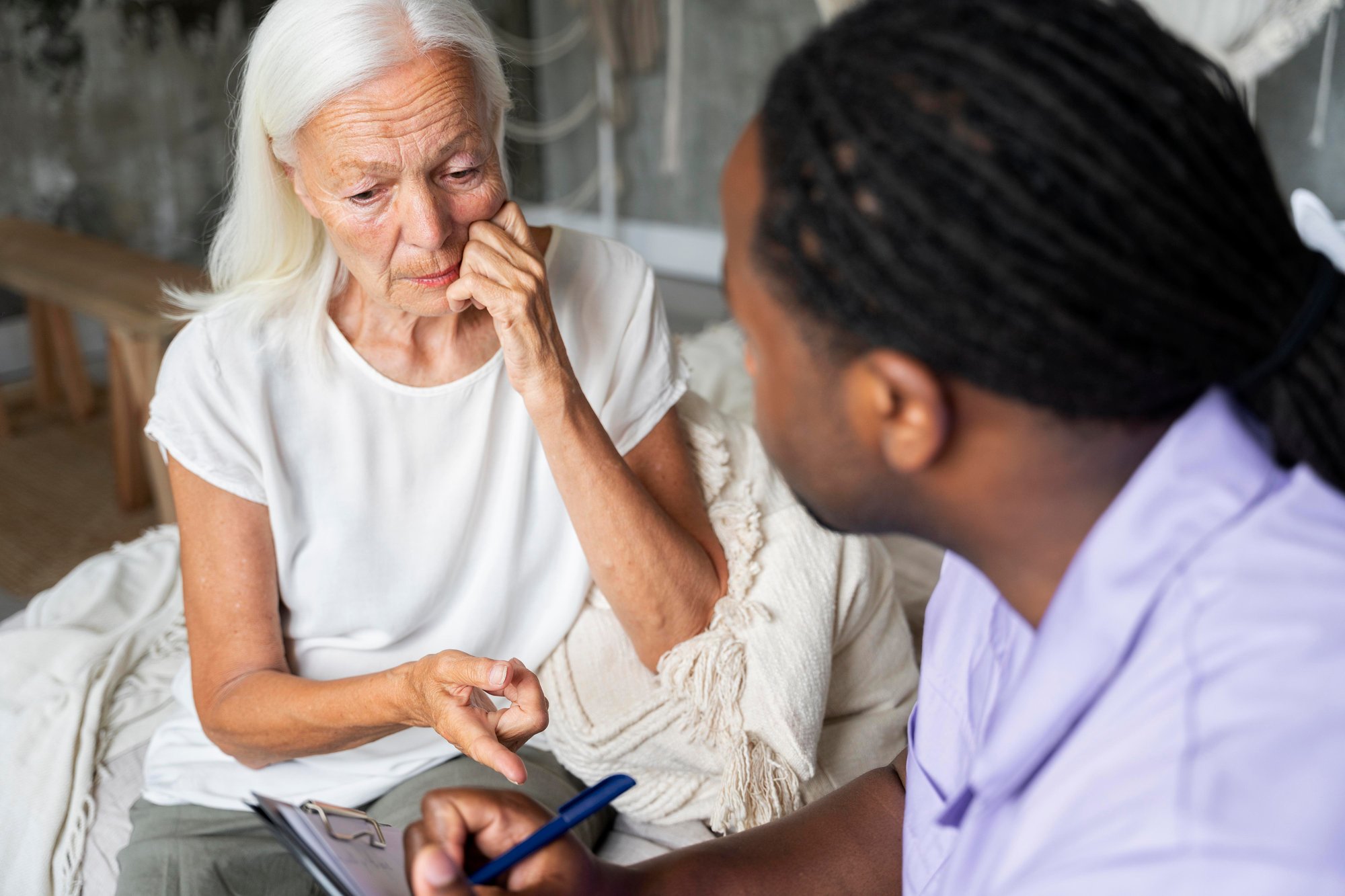 social-worker-taking-care-old-woman